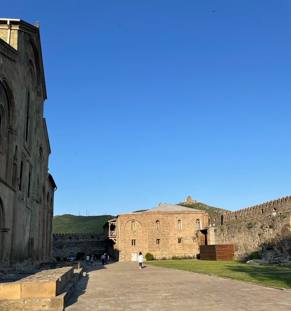 Courtyard of Svetitskhoveli with Jvari visible in the distance