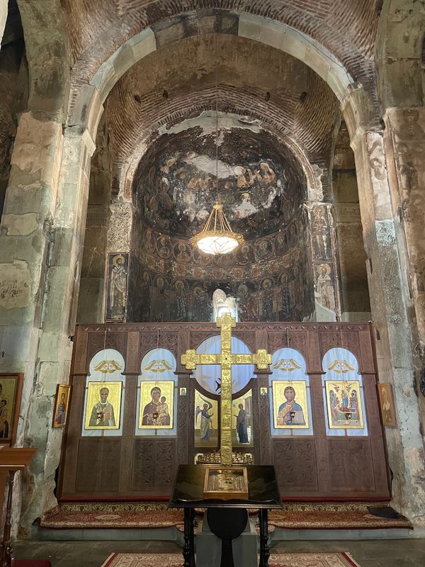 Inside Dmanisi Sioni Cathedral — iconostasis and frescoes