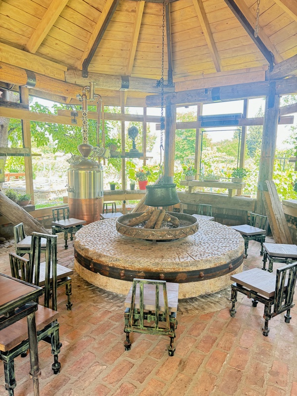 Pavilion with open fireplace and still