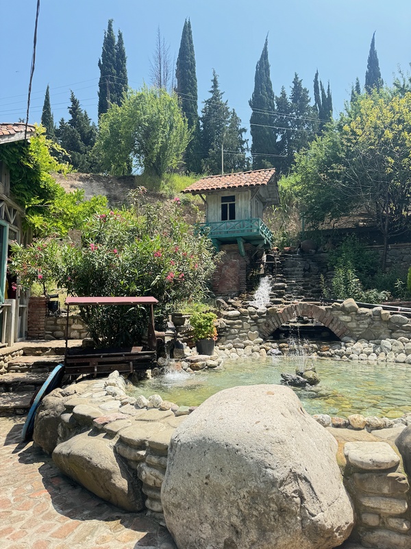 Winery garden with pond and watermill